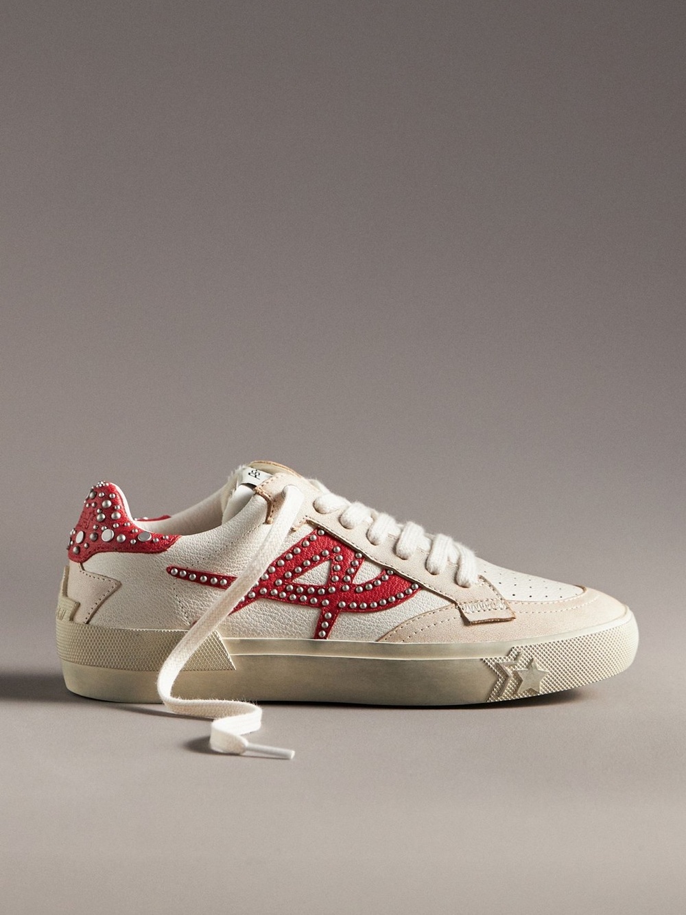 Women’s Cream Sneaker with Red Studded Accent